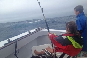 Woman Catches a Big Tuna Fish