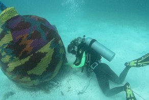 Artist Dives Underwater To Knit Cozy Sweaters For Submerged Objects