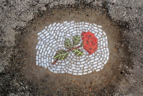 Artist Fills In Chicago's Potholes With Beautiful Flower Mosaics