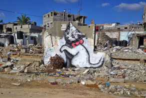 Banksy Sneaks Into Gaza To Create Controversial Street Art