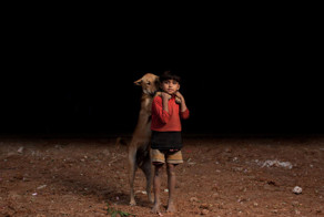 These 10 Orphan Boys Chose To Share The Little Food They Have With 10 Dogs