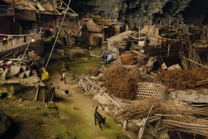 This Giant Cave In China Has 100 People Living Inside, A Basketball Court And Even Had A School