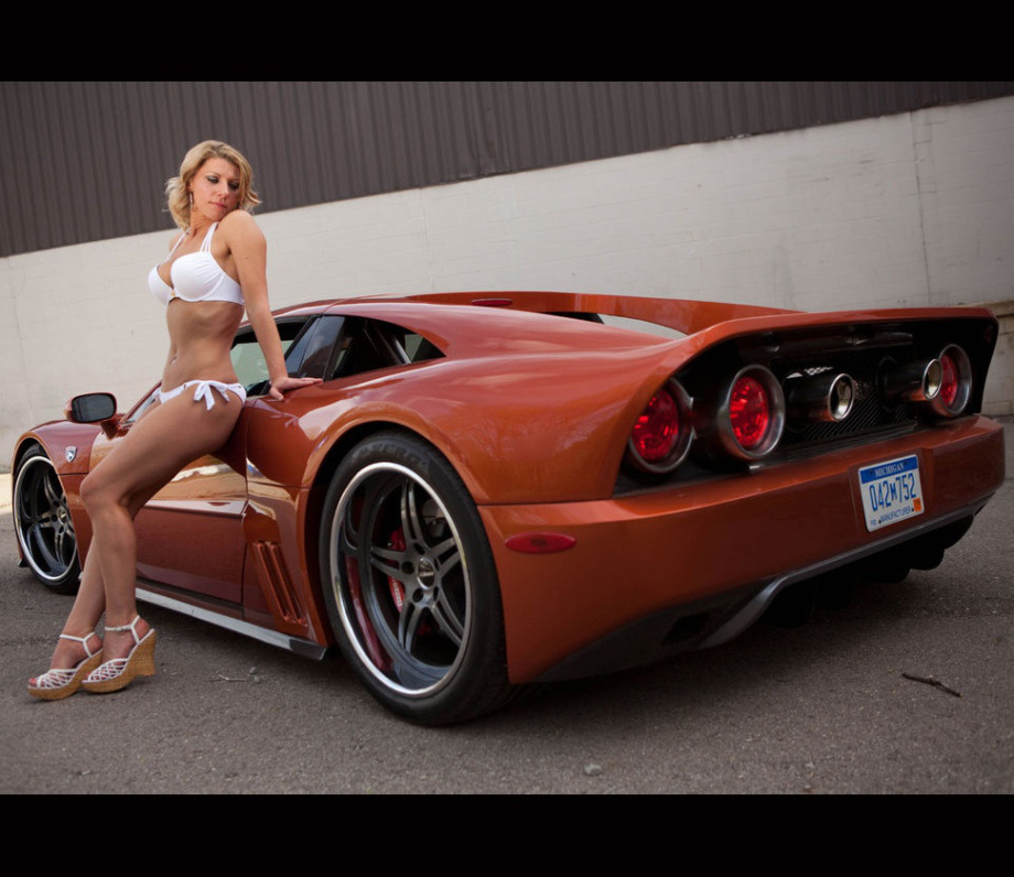 Cool car with naked latina