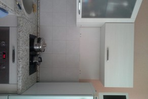 Решение организации пространтсва над плитой на кухне