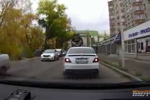 КамАЗ засосало в дорогу