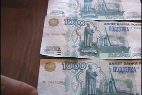 Как отличить фальшивые деньги от настоящих? 