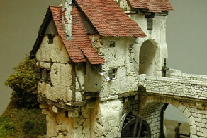 Красивая модель моста и старой мельницы