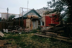 Автомобили на крышах зданий и сооружений