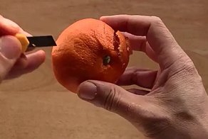 Резьба на кожуре мандарина