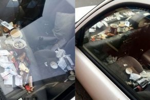 Грязный салон автомобиля для доставки пиццы в Великобритании