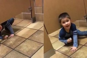 Сидевший на унитазе мужчина был очень удивлён, когда под дверь его кабинки заполз незнакомый ребёнок