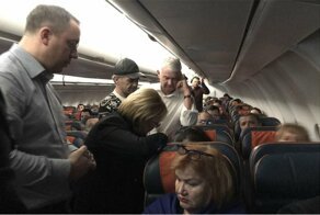 Профпригодность: глава российского Минздрава оказала экстренную помощь на борту самолета