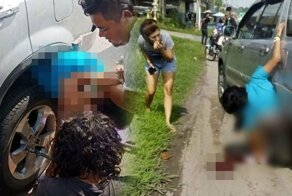 Женщину намотало на колесо кроссовера в Таиланде