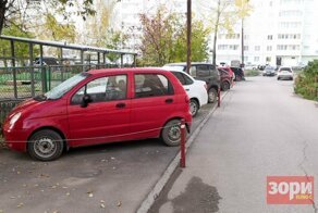 "Личные" парковки во дворе признали незаконными