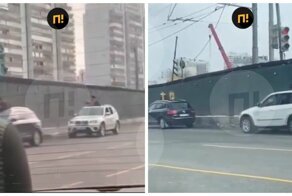 Московские батюшки прямо из джипов освятили Ленинский проспект, проезжая на красный свет