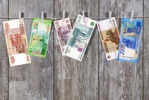 Глава Гознака заступился за обычные бумажные деньги