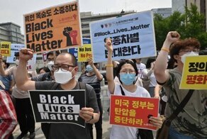 Лица протеста: фотографии акций Black Lives Matter со всего мира