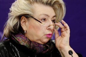 Чем объясняется преданность именитого тренера одному и тому же аксессуару?