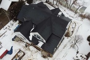 Кровля от Tesla, вырабатывающая электроэнергию, может сама избавляться от снега