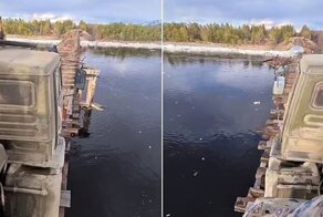 Видео: грузовик едет по узкому мосту через реку Витим (Забайкалье)
