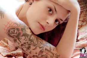 Девушки с татуировками в самых интересных местах (52 фото)