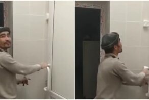 Позитивный рабочий выдаёт квест по открыванию двери