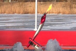 Роботы передали друг другу олимпийский огонь под водой