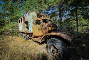 На окраине Припяти - десятки перевернутых автобусов и японская спецтехника