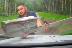 «Штраф» шлагбаумом за неудачную парковку
