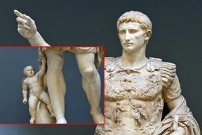 Почему у статуи Октавиана Августа младенец у ног?