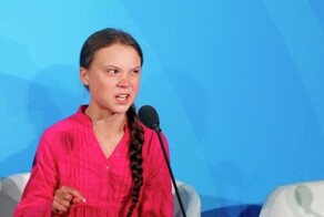 Экоактивисты снова в деле: надели маски с портретом Шольца и заблокировали дороги в Германии