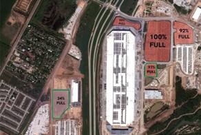 Переполненные парковки с непроданными электрокарами Tesla видно из космоса