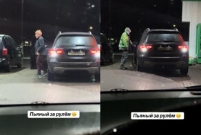 На минской заправке водитель не смог уехать, пока работник держал дверь его авто