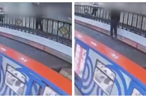 В Москве  мужчина забрался на крышу поезда в метро