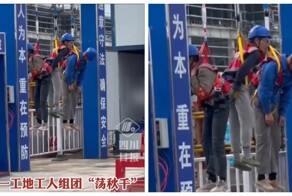 Китайских строителей подвесили в наказание за нарушение техники безопасности во время высотных работ