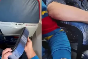 Подлокотник для пассажирского сиденья в самолёте