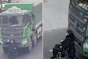 Инвалид-колясочник выехал перед фурой и совершил экстремальную поездку