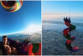 Парень и девушка скатились с горки на большой высоте