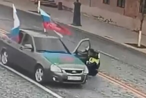 Полицейский проехал десятки метров на двери авто нарушителя
