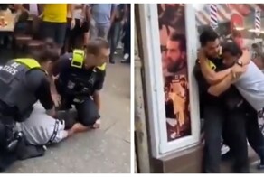 Профессиональная немецкая полиция втроём пытаются скрутить мигранта