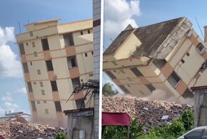 Здание рухнуло на экскаватор во время сноса
