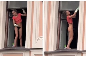 Петербурженка в стрингах мыла окна, стоя на хлипком подоконнике