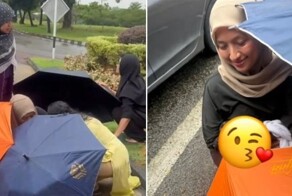 Женщина родила прямо на&nbsp;дороге, пока прохожие закрывали её зонтиками