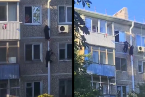 В Краснодаре мужчина и женщина вылезли из окна на водосточную трубу пятиэтажки