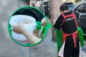 Сотрудница ресторана черпала отработанное масло из мусорного бака