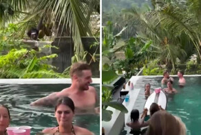 Представитель племени из Шри-Ланки наблюдает за туристами