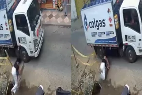 Неосторожный шаг на стройке: мать с ребёнком едва не попали под грузовик