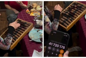 Женщина посчитала большую сумму на счётах