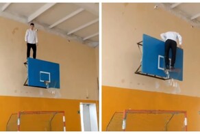 Школьник на уроке физкультуры залез на баскетбольный щит и устроил представление с сальто