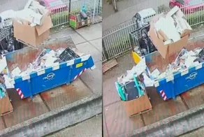 Водитель погрузчика борется с упрямым ящиком